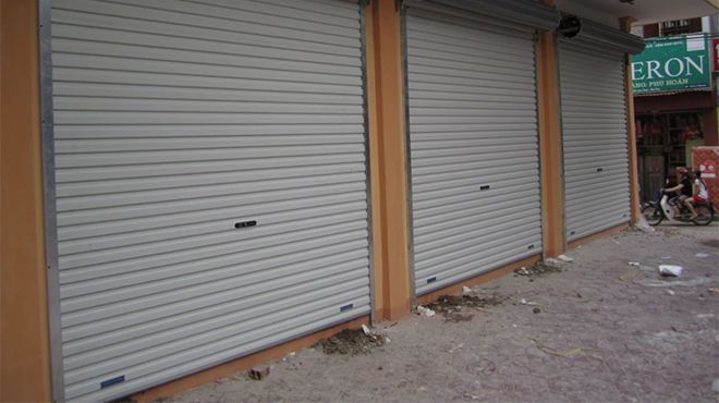 cách sửa cửa cuốn kéo tay